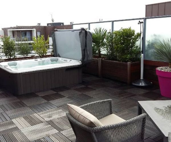 sundance-hot-tub-deck-installation-roof-top-in-wichita